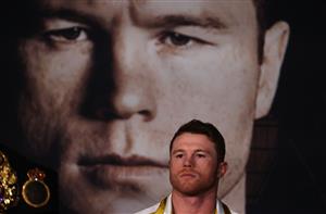 ARLINGTON, TEXAS - MAY 06: Canelo Alvarez looks on against Billy Joe Saunders during the press conference for Alvarez's WBC and WBA super middleweight titles and Saunders' WBO super middleweight title at Live! by Loews hotel on May 06, 2021 in Arlington, Texas. (Getty Images)