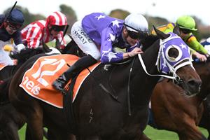 MELBOURNE, AUSTRALIA - MAY 08: Teodore Nugent riding Rousseau winning Race 7, the Rod Fenwick Handicap, during Melbourne Racing at Caulfield Racecourse on May 08, 2021 in Melbourne, Australia. (Photo by Vince Caligiuri/Getty Images)