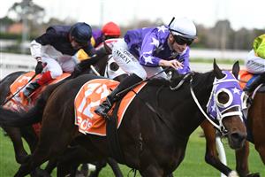 MELBOURNE, AUSTRALIA - MAY 08: Teodore Nugent riding Rousseau winning Race 7, the Rod Fenwick Handicap, during Melbourne Racing at Caulfield Racecourse on May 08, 2021 in Melbourne, Australia. (Photo by Vince Caligiuri/Getty Images)