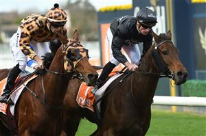 MELBOURNE, AUSTRALIA - MAY 08: Jockey Daniel Stackhouse rides Ruby Skye (r) defeats Lachlan King riding No Effort in Race 3, the Cameron Plant Memorial Handicap, during Melbourne Racing at Caulfield Racecourse on May 08, 2021 in Melbourne, Australia. (Photo by Vince Caligiuri/Getty Images)