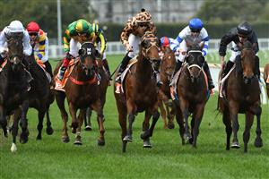 MELBOURNE, AUSTRALIA - MAY 08: Jockey Daniel Stackhouse rides Ruby Skye (r) defeats Lachlan King riding No Effort in Race 3, the Cameron Plant Memorial Handicap, during Melbourne Racing at Caulfield Racecourse on May 08, 2021 in Melbourne, Australia. (Photo by Vince Caligiuri/Getty Images)