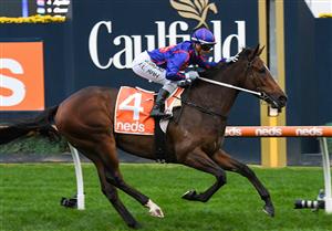 MELBOURNE, AUSTRALIA - MAY 08: Jamie Kah makes in five winners for the day after riding Ayrton to win Race 9, the Darren Gauci Handicap, during Melbourne Racing at Caulfield Racecourse on May 08, 2021 in Melbourne, Australia. (Photo by Vince Caligiuri/Getty Images)