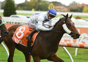 MELBOURNE, AUSTRALIA - MAY 08: Jamie Kah riding Streetcar Stranger winning race 6, the Thomas North Handicap, during Melbourne Racing at Caulfield Racecourse on May 08, 2021 in Melbourne, Australia. (Photo by Vince Caligiuri/Getty Images)