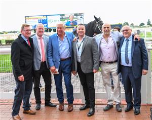 MELBOURNE, AUSTRALIA - MAY 08: Trainer Steve Richards poses with connections after Holbein won race 5, the Jra Handicap, during Melbourne Racing at Caulfield Racecourse on May 08, 2021 in Melbourne, Australia. (Photo by Vince Caligiuri/Getty Images)