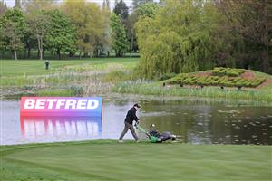 SUTTON COLDFIELD, ENGLAND - MAY 11: A greenkeeper cuts the lawn as they prepare the course during previews ahead of The Betfred British Masters hosted by Danny Willett at The Belfry on May 11, 2021 in Sutton Coldfield, England. (Getty Images)