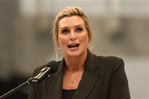 SYDNEY, AUSTRALIA - MAY 13: Johanna Griggs speaks during the Australian 2020 Tokyo Olympic Games Swimming Uniform Launch at Sydney Olympic Park Aquatic Centre on May 13, 2021 in Sydney, Australia. (Photo by Cameron Spencer/Getty Images)