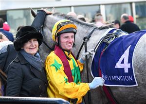MELBOURNE, AUSTRALIA - MAY 15: Wendy Kelly poses with Michael Poy after Cakewalk Baby won Race 2, the Goodwood Trophy, during Melbourne Racing at Flemington Racecourse on May 15, 2021 in Melbourne, Australia. (Photo by Vince Caligiuri/Getty Images)