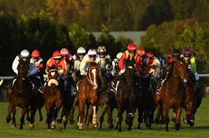 MELBOURNE, AUSTRALIA - MAY 15: Mark Zahra riding Vegas Knight (red cap) on the home turn before winning Race 9, the York Trophy, during Melbourne Racing at Flemington Racecourse on May 15, 2021 in Melbourne, Australia. (Photo by Vince Caligiuri/Getty Images)