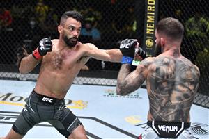 LAS VEGAS, NEVADA - MAY 22: In this handout image provided by UFC, (L-R) Rob Font punches Cody Garbrandt in their bantamweight bout during the UFC Fight Night event at UFC APEX on May 22, 2021 in Las Vegas, Nevada. (Getty Images)