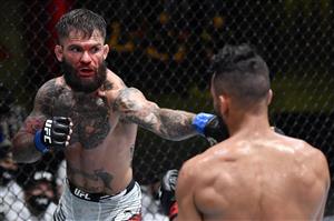 LAS VEGAS, NEVADA - MAY 22: In this handout image provided by UFC, (L-R) Cody Garbrandt punches Rob Font in their bantamweight bout during the UFC Fight Night event at UFC APEX on May 22, 2021 in Las Vegas, Nevada. (Getty Images)