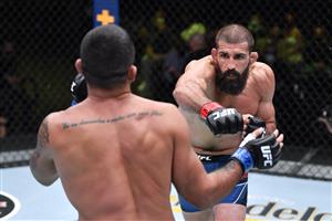 LAS VEGAS, NEVADA - MAY 22: In this handout images provided by UFC, (R-L) Court McGee punches Claudio Silva of Brazil in their welterweight bout during the UFC Fight Night event at UFC APEX on May 22, 2021 in Las Vegas, Nevada. (Getty Images)