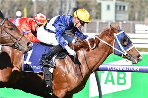 MELBOURNE, AUSTRALIA - MAY 22: Daniel Moor riding Blushing Tycoon winning Race 3, theRacing.com Plate, during Melbourne Racing at Flemington Racecourse on May 22, 2021 in Melbourne, Australia. (Photo by Vince Caligiuri/Getty Images)