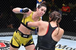 LAS VEGAS, NEVADA - MAY 22: In this handout image provided by UFC, (L-R) Norma Dumont Viana of Brazil punches Felicia Spencer of Canada in their women's featherweight bout during the UFC Fight Night event at UFC APEX on May 22, 2021 in Las Vegas, Nevada. (Getty Images)