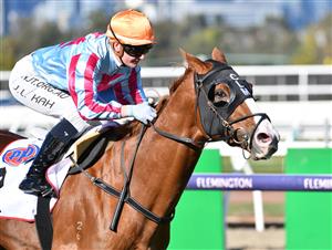 MELBOURNE, AUSTRALIA - MAY 22: Jamie Kah riding Heart Of Puissance winning Race 4, the Pfd Food Services Plate, during Melbourne Racing at Flemington Racecourse on May 22, 2021 in Melbourne, Australia. (Photo by Vince Caligiuri/Getty Images)