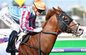 MELBOURNE, AUSTRALIA - MAY 22: Jamie Kah riding Heart Of Puissance winning Race 4, the Pfd Food Services Plate, during Melbourne Racing at Flemington Racecourse on May 22, 2021 in Melbourne, Australia. (Photo by Vince Caligiuri/Getty Images)