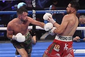 LAS VEGAS, NEVADA - MAY 22: Jose Ramirez (R) and Josh Taylor battle during their junior welterweight world unification title fight at Virgin Hotels Las Vegas on May 22, 2021 in Las Vegas, Nevada. Taylor won by unanimous decision. (Getty Images)