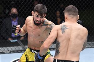 LAS VEGAS, NEVADA - MAY 22: In this handout image provided by UFC, (L-R) Bruno Silva of Brazil punches Victor Rodriguez in their flyweight bout during the UFC Fight Night event at UFC APEX on May 22, 2021 in Las Vegas, Nevada. (Getty Images)