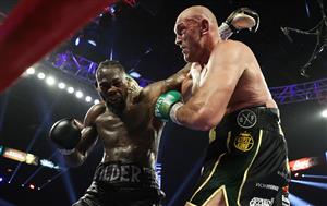 LAS VEGAS, NEVADA - FEBRUARY 22: Tyson Fury punches Deontay Wilder during their Heavyweight bout for Wilder's WBC and Fury's lineal heavyweight title on February 22, 2020 at MGM Grand Garden Arena in Las Vegas, Nevada. (Getty Images)