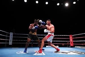 SYDNEY, AUSTRALIA - MAY 26: Justis Huni and Christian Tsoye exchange punches during the Australian Heavyweight bout between Justis Huni and Christian Tsoye at ICC Sydney on May 26, 2021 in Sydney, Australia. (Getty Images)