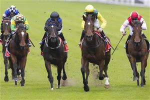 SYDNEY, AUSTRALIA - MAY 29: Jay Ford (yellow cap) on Adelong wins race 6 the Fujitsu General Handicap during Sydney Racing at Royal Randwick Racecourse on May 29, 2021 in Sydney, Australia. (Photo by Jenny Evans/Getty Images)