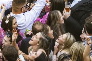 SYDNEY, AUSTRALIA - MAY 29: People are seen singing and dancing during Sydney Racing at Royal Randwick Racecourse on May 29, 2021 in Sydney, Australia. (Photo by Jenny Evans/Getty Images)
