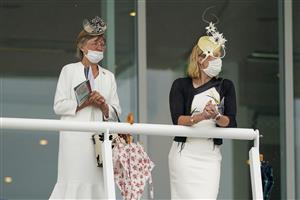 EPSOM, ENGLAND - JUNE 04: Fashion at Epsom Racecourse on June 04, 2021 in Epsom, England. Due to the Coronavirus pandemic only owners along with a limited number of the paying public will be allowed to attend the meeting. (Photo by Alan Crowhurst/Getty Images)