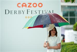 EPSOM, ENGLAND – JUNE 4: Racegoers arrive during day one of the Cazoo Derby Festival at Epsom Racecourse on June 4, 2021 in Epsom, England. (Photo by John Walton-Pool/Getty Images)