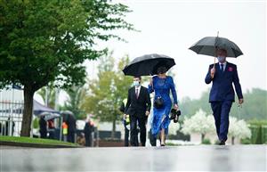 EPSOM, ENGLAND – JUNE 4: Racegoers arrive during day one of the Cazoo Derby Festival at Epsom Racecourse on June 4, 2021 in Epsom, England. (Photo by John Walton-Pool/Getty Images)