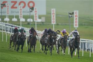 EPSOM, ENGLAND - JUNE 04: Mark Crehan riding Oscula (R, white) win The Cazoo Woodcote EBF Stakes at Epsom Racecourse on June 04, 2021 in Epsom, England. Due to the Coronavirus pandemic only owners along with a limited number of the paying public will be allowed to attend the meeting. (Photo by Alan Crowhurst/Getty Images)