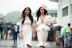 EPSOM, ENGLAND – JUNE 4: Racegoers arrive during day one of the Cazoo Derby Festival at Epsom Racecourse on June 4, 2021 in Epsom, England. (Photo by John Walton-Pool/Getty Images)