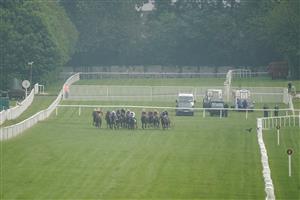 EPSOM, ENGLAND - JUNE 04: A general view as runners in The Cazoo Oaks make their way across to the stand side rail at Epsom Racecourse on June 04, 2021 in Epsom, England. Due to the Coronavirus pandemic only owners along with a limited number of the paying public will be allowed to attend the meeting. (Photo by Alan Crowhurst/Getty Images)