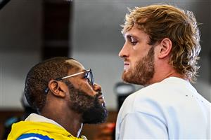 Former world welterweight king Floyd Mayweather (L) and YouTube personality Logan Paul face-off during the media availability ahead of their June 6 exhibition boxing match, on June 3, 2021 at Villa Casa Casuarina at the former Versace Mansion in Miami Beach, on June 3, 2021. (Getty Images)