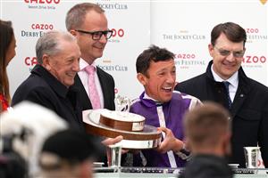 EPSOM, ENGLAND - JUNE 04: Jockey Frankie Dettori (second right) celebrates with the trophy after winning the Cazoo Oaks (Fillies' Group 1) (British Champions Series) race with trainer Aidan O'Brien (right) at Epsom Racecourse on June 4, 2021 in Epsom, England. (Photo by John Walton - Pool/Getty Images)
