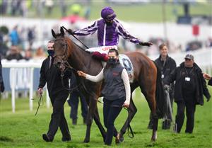 EPSOM, ENGLAND - JUNE 04: Jockey Frankie Dettori celebrates after winning the Cazoo Oaks (Fillies' Group 1) (British Champions Series) race with Snowfall at Epsom Racecourse on June 4, 2021 in Epsom, England. (Photo by John Walton - Pool/Getty Images)