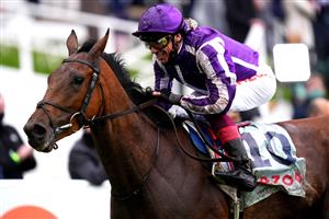 EPSOM, ENGLAND - JUNE 04: Snowfall ridden by Frankie Dettori wins the Cazoo Oaks (Fillies' Group 1) (British Champions Series) race at Epsom Racecourse on June 4, 2021 in Epsom, England. (Photo by John Walton - Pool/Getty Images)