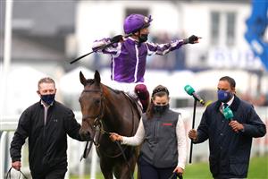 EPSOM, ENGLAND - JUNE 04: Jockey Frankie Dettori celebrates after winning the Cazoo Oaks (Fillies' Group 1) (British Champions Series) race with Snowfall at Epsom Racecourse on June 4, 2021 in Epsom, England. (Photo by John Walton - Pool/Getty Images)