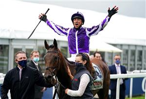 EPSOM, ENGLAND - JUNE 04: Jockey Frankie Dettori celebrates after winning the Cazoo Oaks (Fillies' Group 1) (British Champions Series) race with Snowfall at Epsom Racecourse on June 4, 2021 in Epsom, England. (Photo by John Walton - Pool/Getty Images)