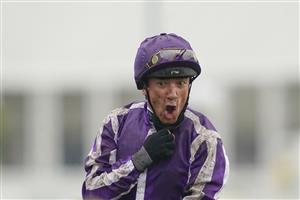 EPSOM, ENGLAND - JUNE 04: Frankie Dettori celebrates after riding Snowfall to win The Cazoo Oaks by sixteen lengths at Epsom Racecourse on June 04, 2021 in Epsom, England. Due to the Coronavirus pandemic only owners along with a limited number of the paying public will be allowed to attend the meeting. (Photo by Alan Crowhurst/Getty Images)