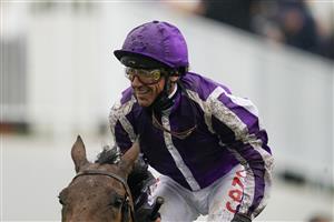 EPSOM, ENGLAND - JUNE 04: Frankie Dettori celebrates as he rides Snowfall to win The Cazoo Oaks by sixteen lengths at Epsom Racecourse on June 04, 2021 in Epsom, England. Due to the Coronavirus pandemic only owners along with a limited number of the paying public will be allowed to attend the meeting. (Photo by Alan Crowhurst/Getty Images)