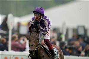 EPSOM, ENGLAND - JUNE 04: Frankie Dettori celebrates as he rides Snowfall to win The Cazoo Oaks by sixteen lengths at Epsom Racecourse on June 04, 2021 in Epsom, England. Due to the Coronavirus pandemic only owners along with a limited number of the paying public will be allowed to attend the meeting. (Photo by Alan Crowhurst/Getty Images)