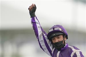 EPSOM, ENGLAND - JUNE 04: Frankie Dettori celebrates after riding Snowfall to win The Cazoo Oaks by sixteen lengths at Epsom Racecourse on June 04, 2021 in Epsom, England. Due to the Coronavirus pandemic only owners along with a limited number of the paying public will be allowed to attend the meeting. (Photo by Alan Crowhurst/Getty Images)