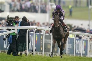 EPSOM, ENGLAND - JUNE 04: Frankie Dettori riding Snowfall win The Cazoo Oaks by sixteen lengths at Epsom Racecourse on June 04, 2021 in Epsom, England. Due to the Coronavirus pandemic only owners along with a limited number of the paying public will be allowed to attend the meeting. (Photo by Alan Crowhurst/Getty Images)
