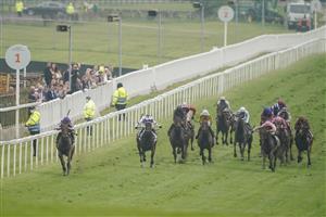 EPSOM, ENGLAND - JUNE 04: Frankie Dettori riding Snowfall (L) win The Cazoo Oaks by sixteen lengths at Epsom Racecourse on June 04, 2021 in Epsom, England. Due to the Coronavirus pandemic only owners along with a limited number of the paying public will be allowed to attend the meeting. (Photo by Alan Crowhurst/Getty Images)