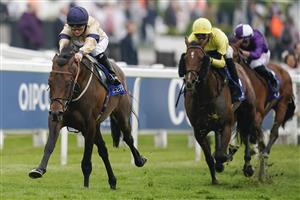 EPSOM, ENGLAND - JUNE 04: Hollie Doyle riding Mehmento (L) win The Play Coral 'Racing-Super-Series' For Free Surrey Stakes at Epsom Racecourse on June 04, 2021 in Epsom, England. Due to the Coronavirus pandemic only owners along with a limited number of the paying public will be allowed to attend the meeting. (Photo by Alan Crowhurst/Getty Images)