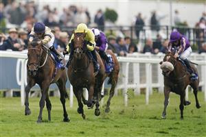 EPSOM, ENGLAND - JUNE 04: Hollie Doyle riding Mehmento (L) win The Play Coral 'Racing-Super-Series' For Free Surrey Stakes at Epsom Racecourse on June 04, 2021 in Epsom, England. Due to the Coronavirus pandemic only owners along with a limited number of the paying public will be allowed to attend the meeting. (Photo by Alan Crowhurst/Getty Images)