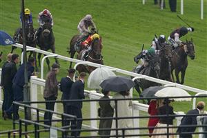 EPSOM, ENGLAND - JUNE 04: Oisin Murphy riding Blue Cup(R, green cap) win The Cazoo Handicap at Epsom Racecourse on June 04, 2021 in Epsom, England. Due to the Coronavirus pandemic only owners along with a limited number of the paying public will be allowed to attend the meeting. (Photo by Alan Crowhurst/Getty Images)