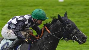 EPSOM, ENGLAND - JUNE 04: Oisin Murphy riding Blue Cup win The Cazoo Handicap at Epsom Racecourse on June 04, 2021 in Epsom, England. Due to the Coronavirus pandemic only owners along with a limited number of the paying public will be allowed to attend the meeting. (Photo by Alan Crowhurst/Getty Images)