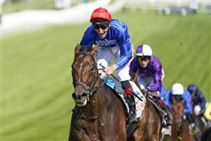 EPSOM, ENGLAND - JUNE 05: Adam Kirby riding Adayar (red cap) win The Cazoo Derby at Epsom Racecourse on June 05, 2021 in Epsom, England. Due to the Coronavirus pandemic, only owners along with a limited number of the paying public will be allowed to attend the meeting. (Photo by Alan Crowhurst/Getty Images)