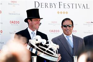 EPSOM, ENGLAND - JUNE 05: Trainer Charlie Appleby celebrates with the trophy after Adayar ridden by jockey Adam Kirby wins the Cazoo Derby during day two of the Cazoo Derby Festival at Epsom Racecourse on June 5, 2021 in Epsom, England. (Photo by John Walton-Pool/Getty Images)