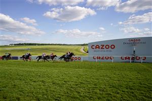 EPSOM, ENGLAND - JUNE 05: David Egan riding Ejtilaab (R, red) win The Cazoo Handicap at Epsom Racecourse on June 05, 2021 in Epsom, England. Due to the Coronavirus pandemic, only owners along with a limited number of the paying public will be allowed to attend the meeting. (Photo by Alan Crowhurst/Getty Images)
